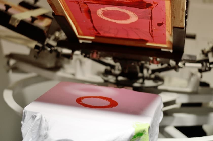 red print being transferred onto a shirt